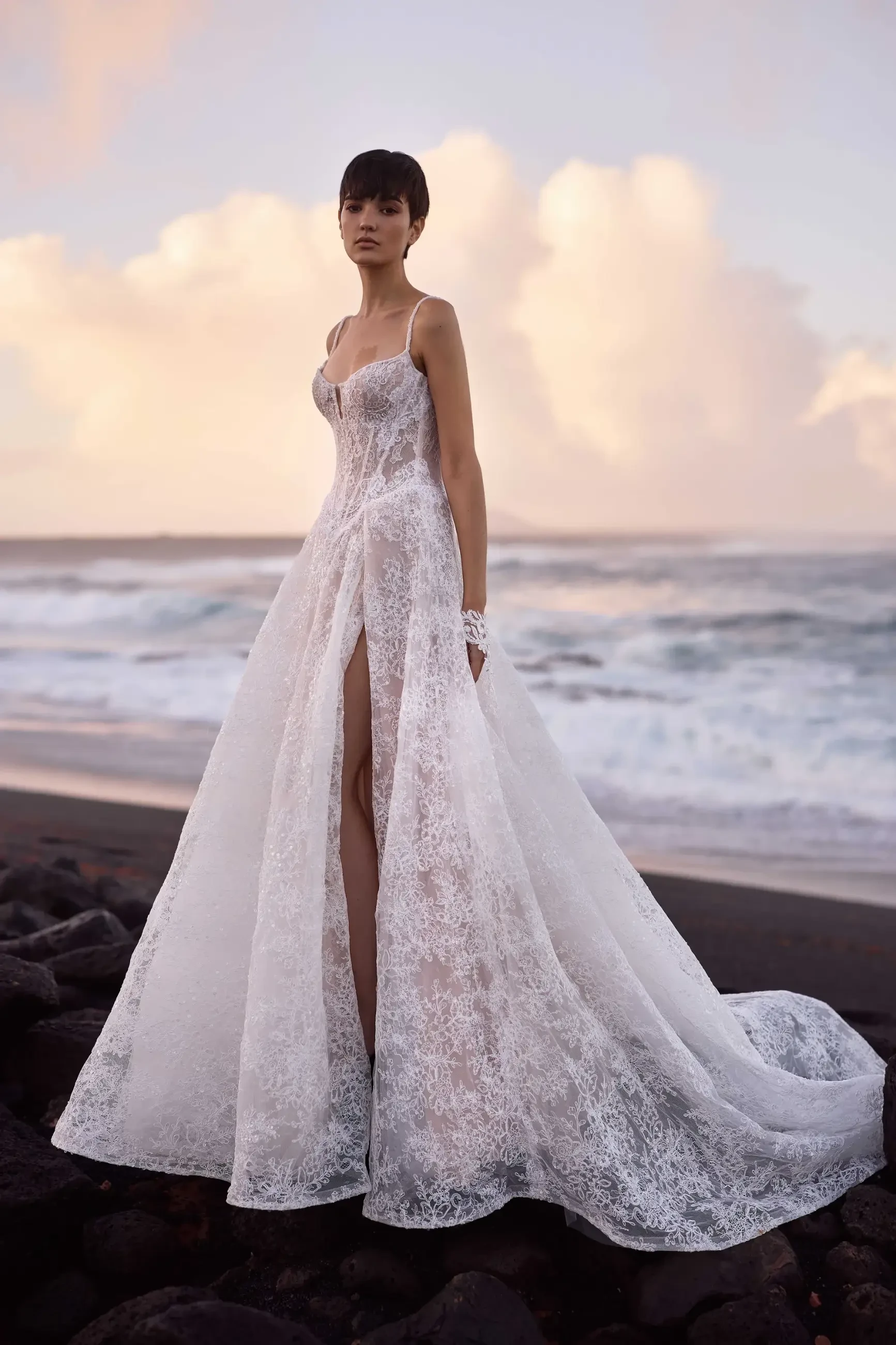 model is wearing a sleeveless a-line wedding dress